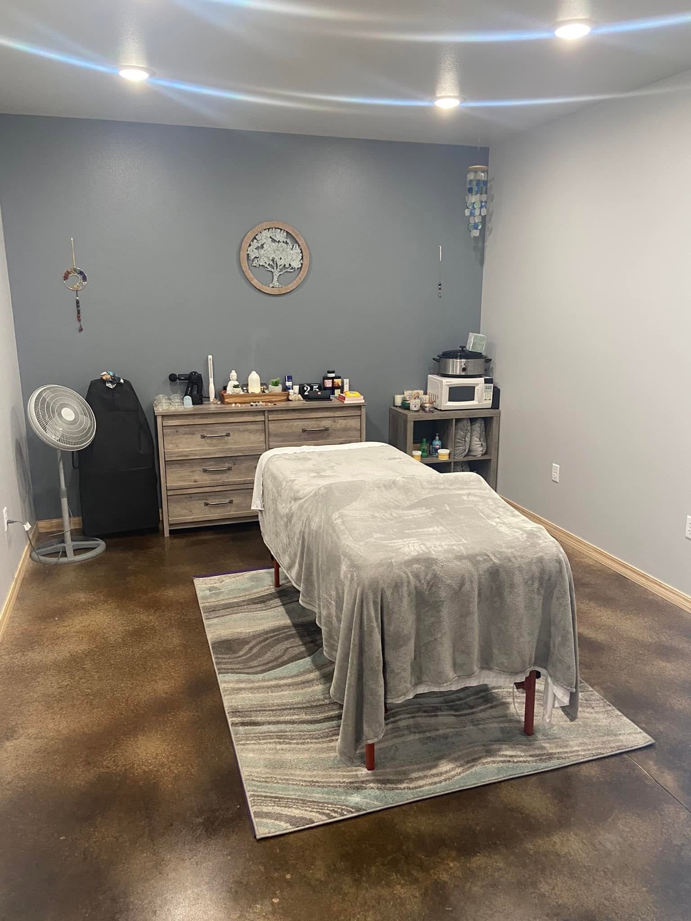 Living Tree massage treatment room with a prepared massage table