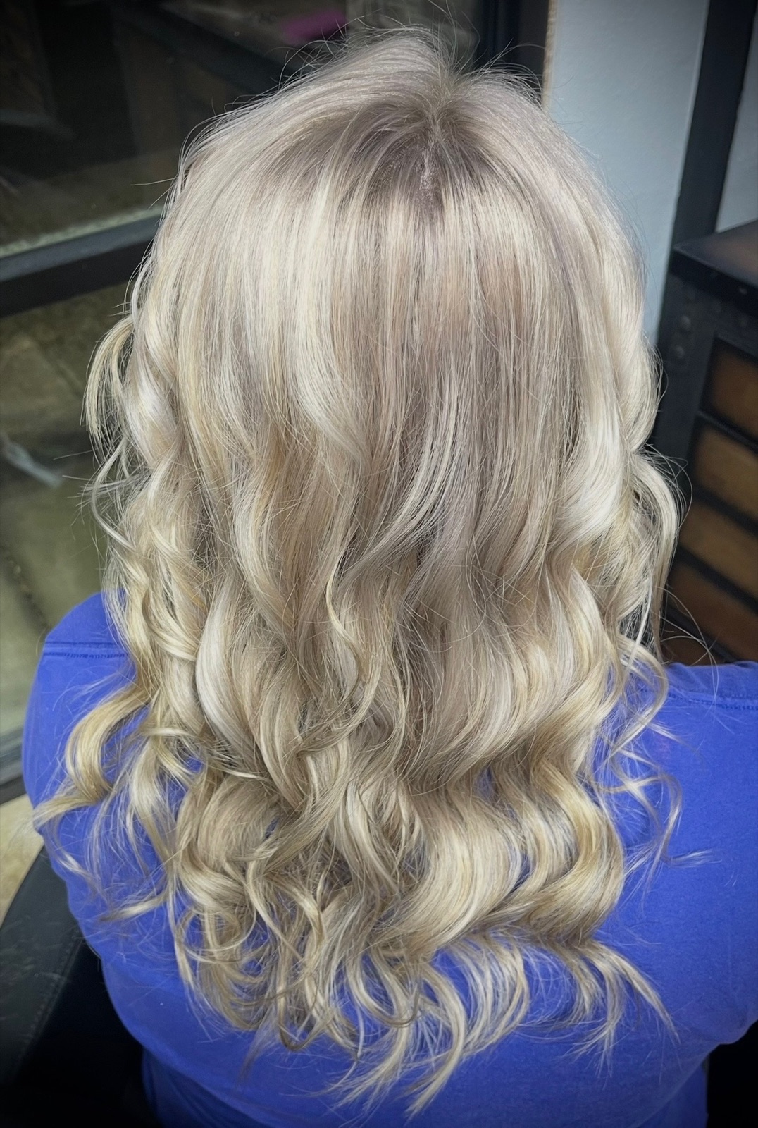 Icy blonde color styled in loose waves by Dusty Ozanich