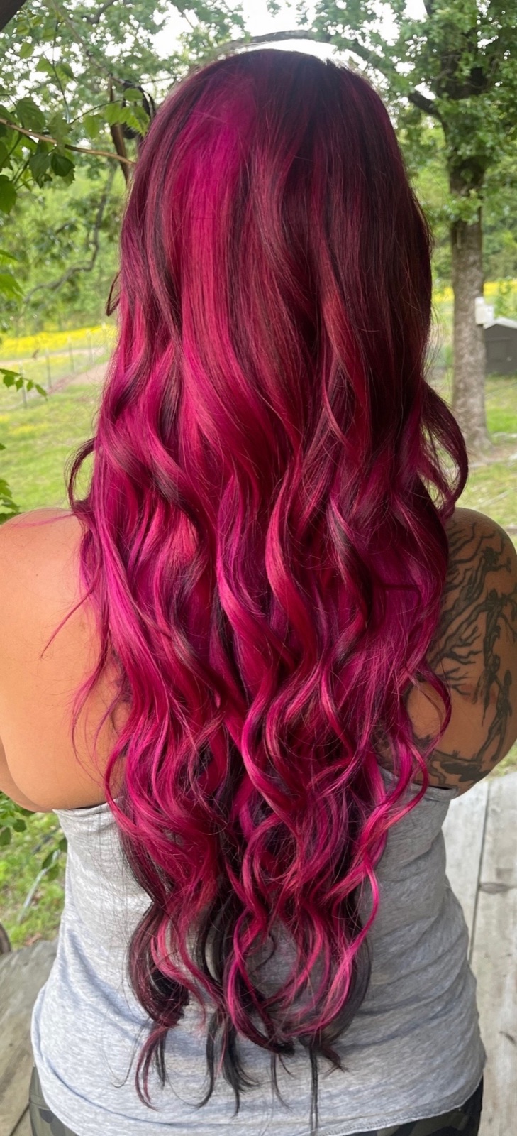 Long magenta vivid-color waves by Dusty Ozanich