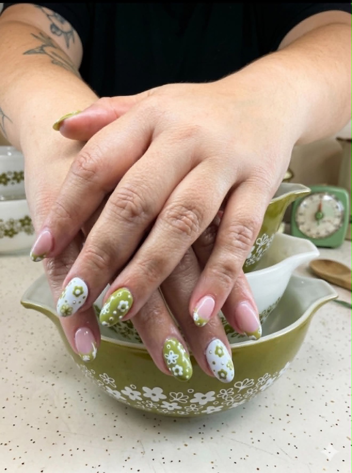 Green and white floral nail art by Kayla Page
