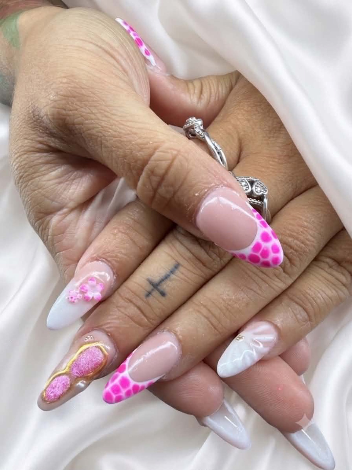 Pink and white floral nail art by Kayla Page
